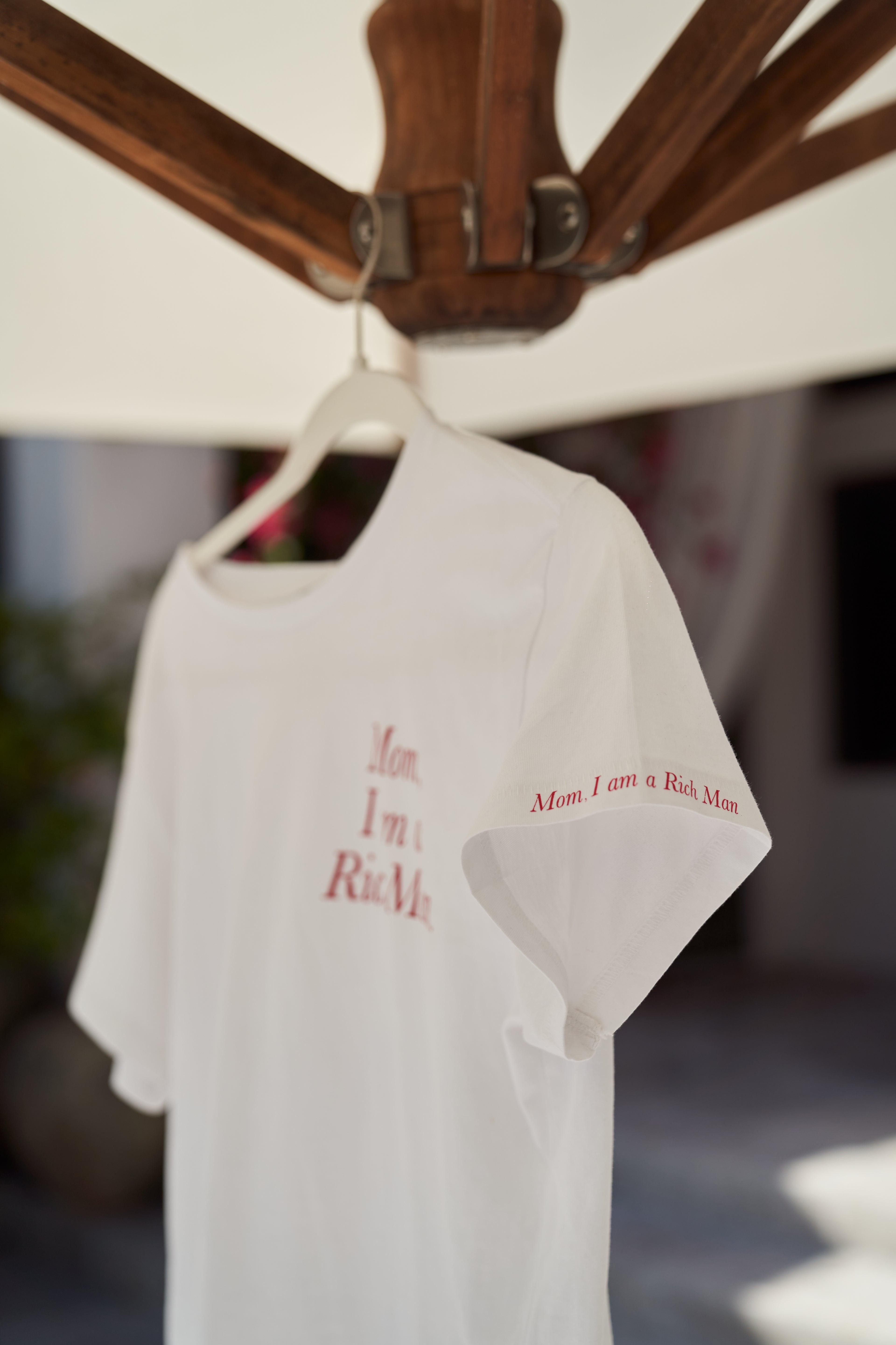 “Mom, I am a rich man” T-shirt in White