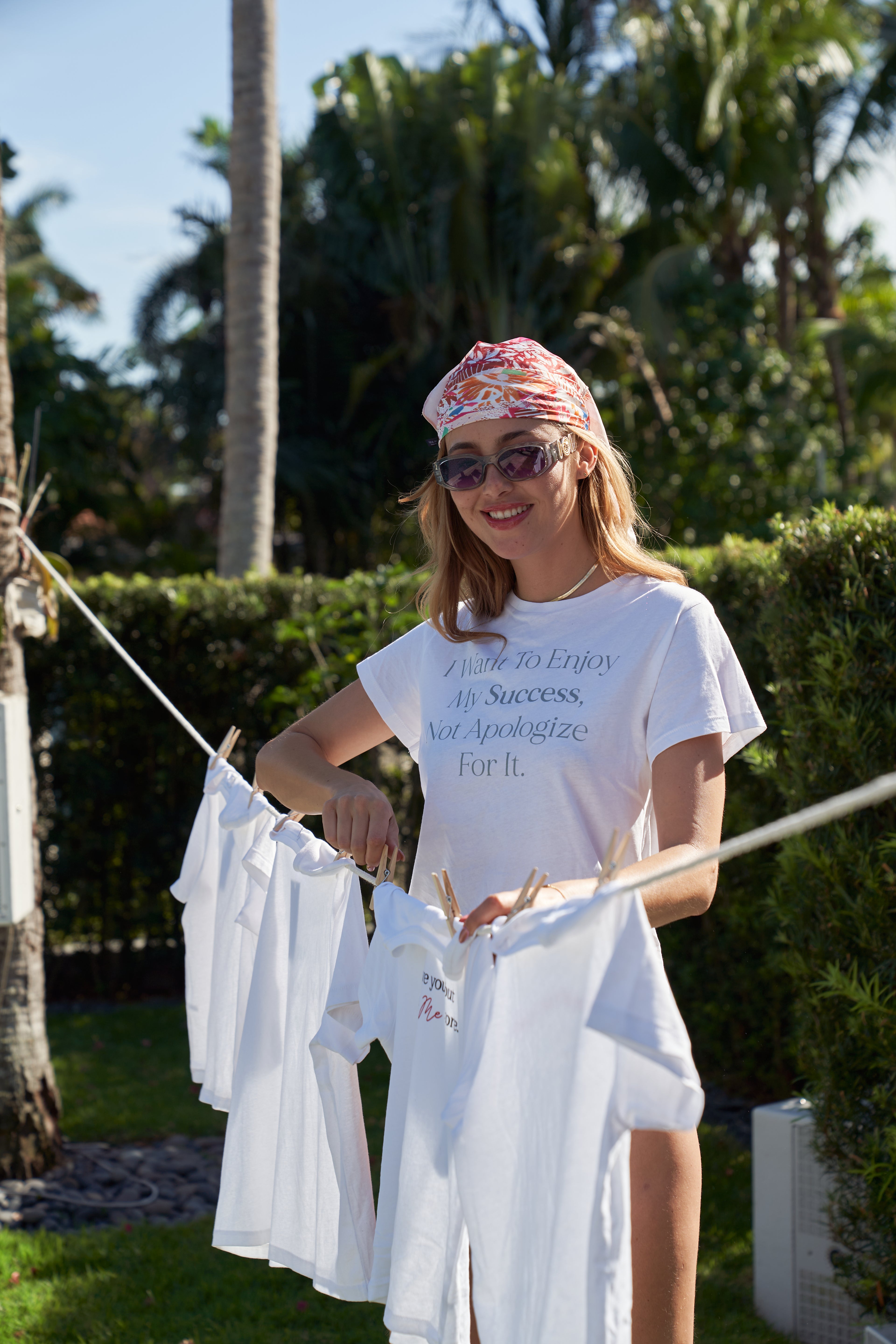 “I want to enjoy my success, not apologize for it” T-shirt in White