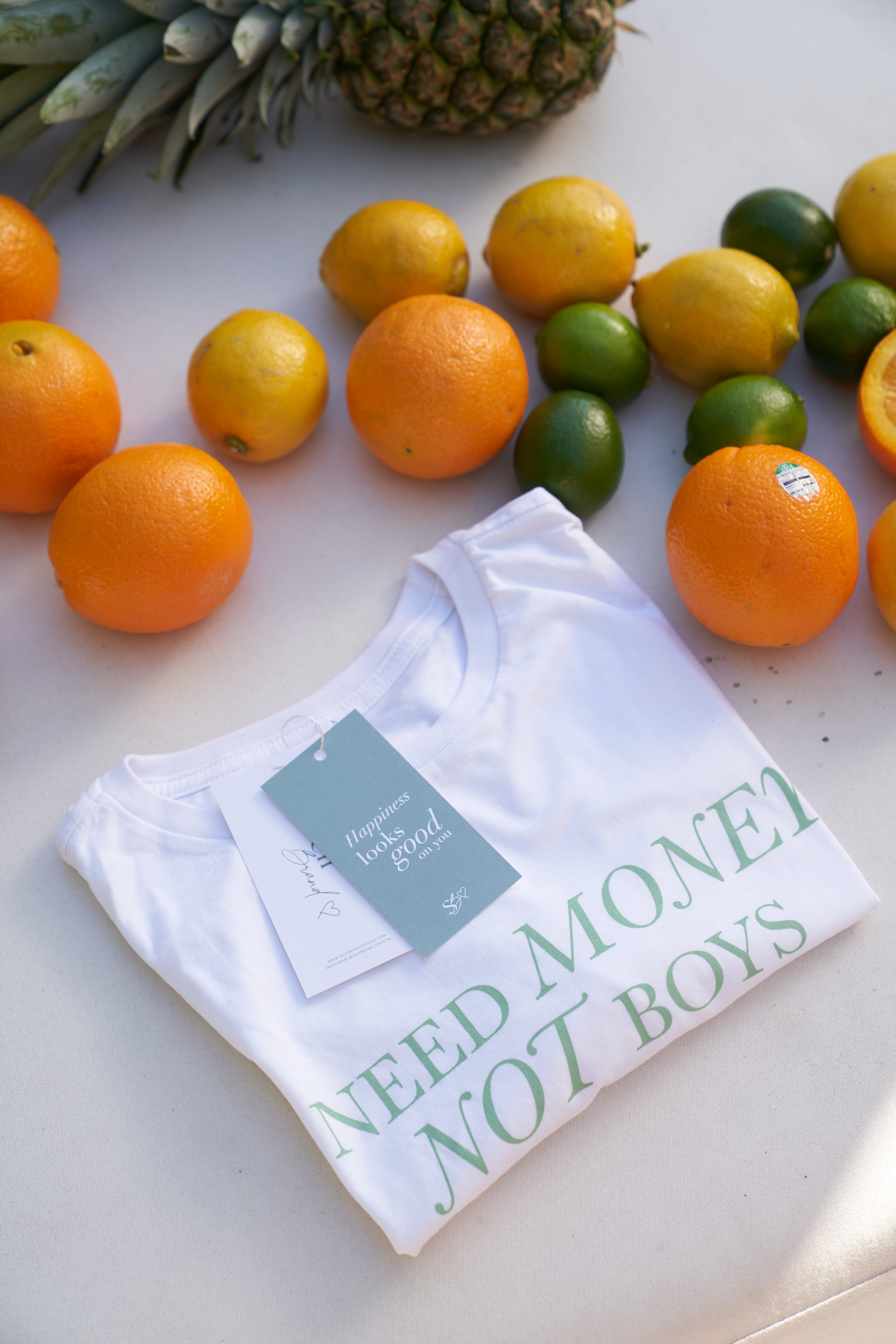 “I need money, not boys” T-shirt in White