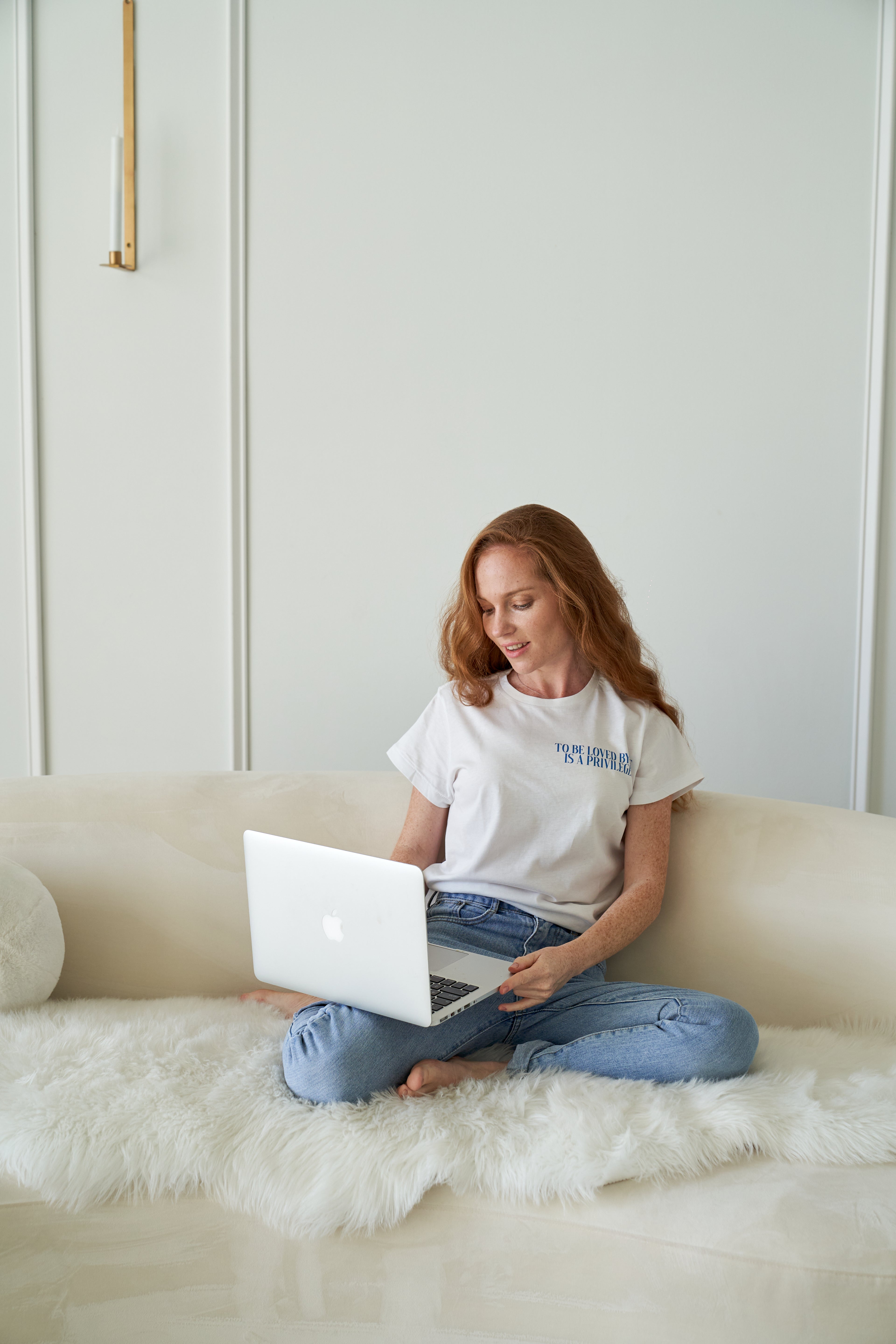 “To be loved by me is a privilege” T-shirt in White