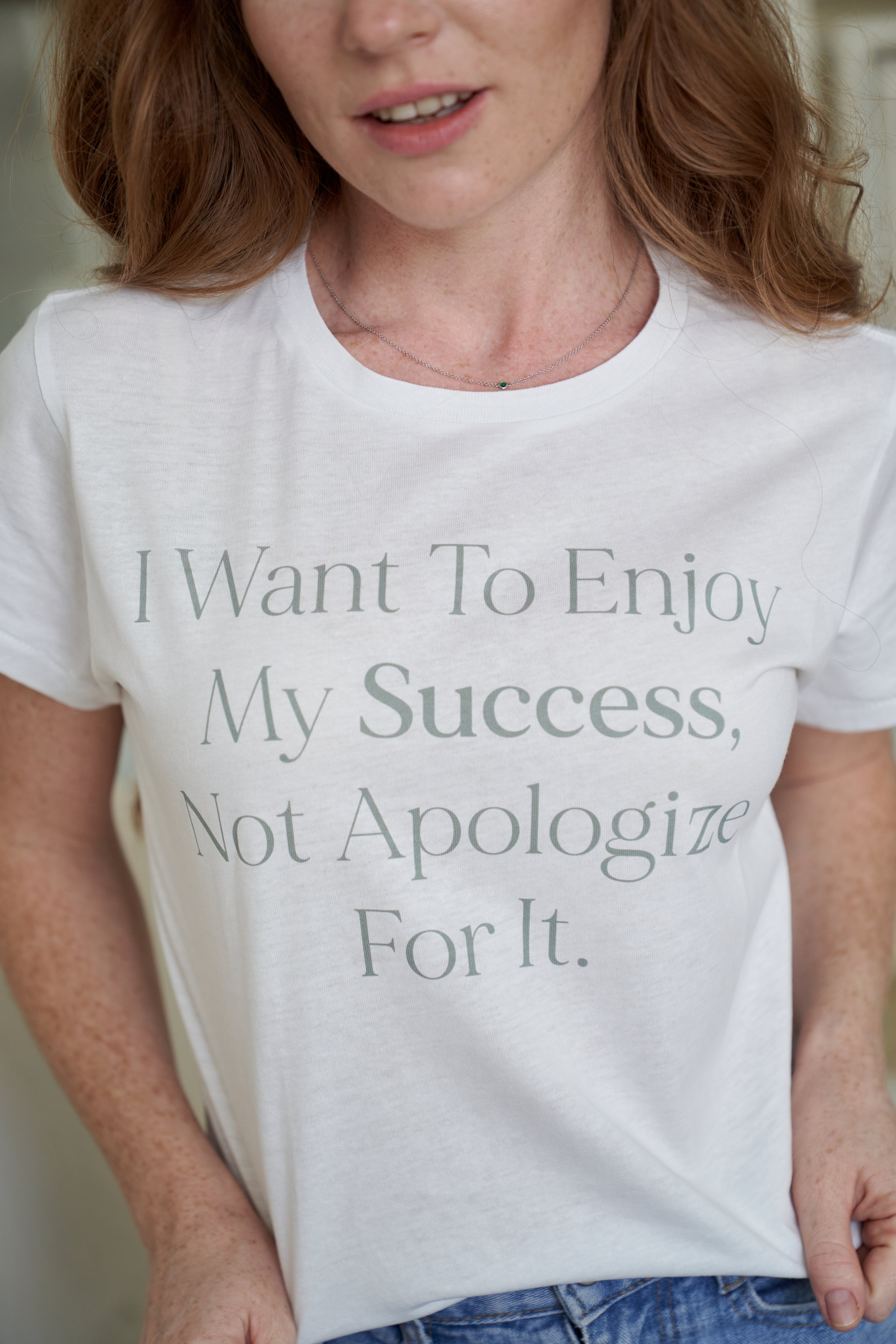 “I want to enjoy my success, not apologize for it” T-shirt in White